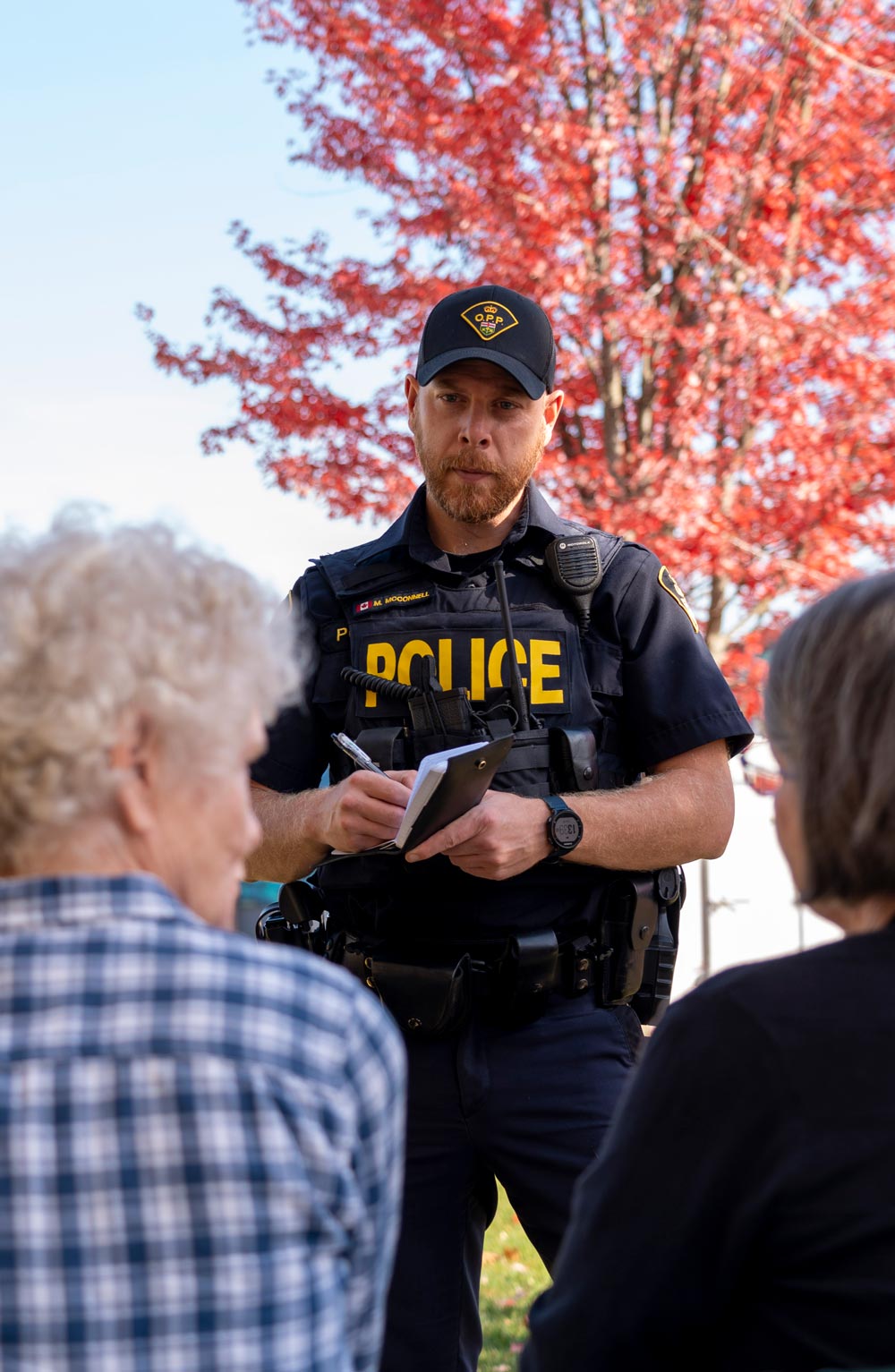 OPP Officer speaking with elderly person