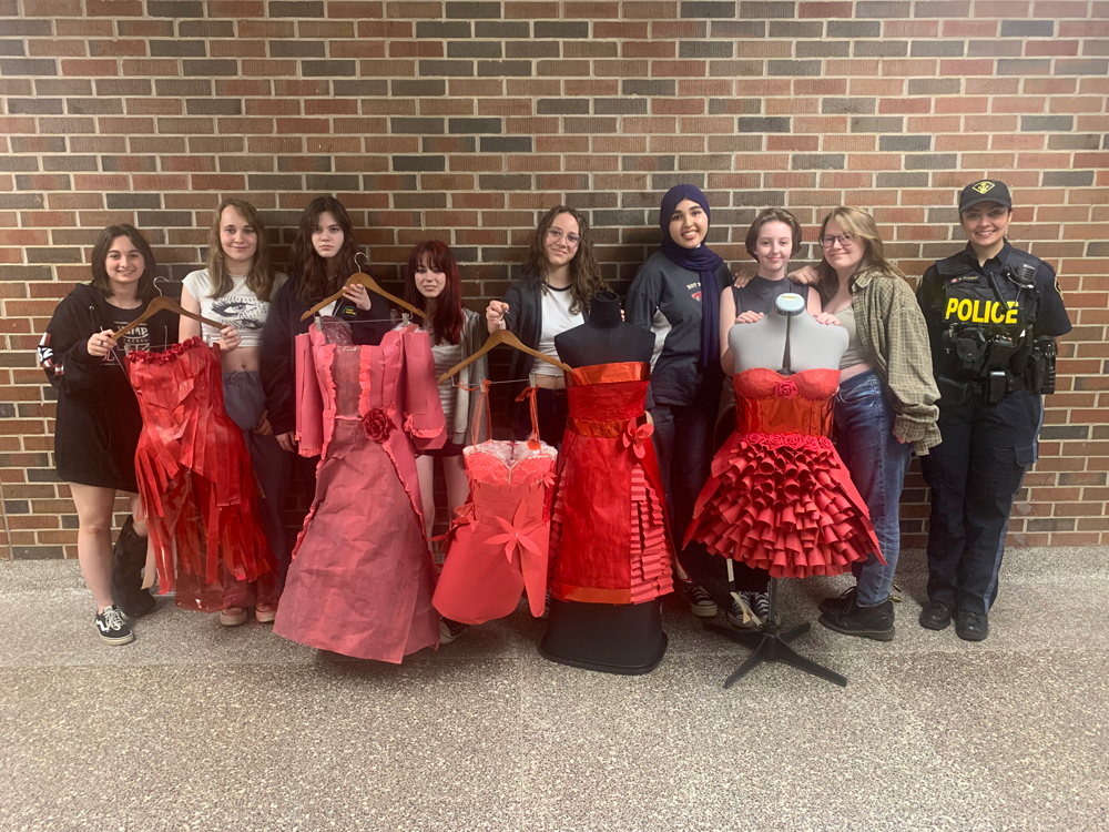 Brant OPP engaged with the Paris High school art class to create dresses for Red Dress Day.
