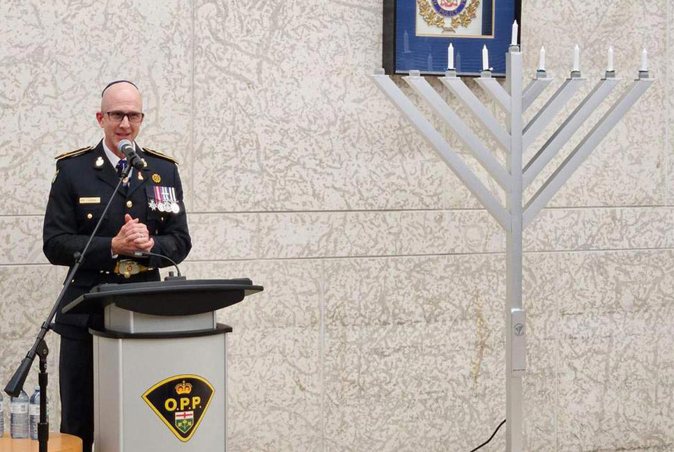 Commissioner Carrique at Menorah lighting ceremony, GHQ