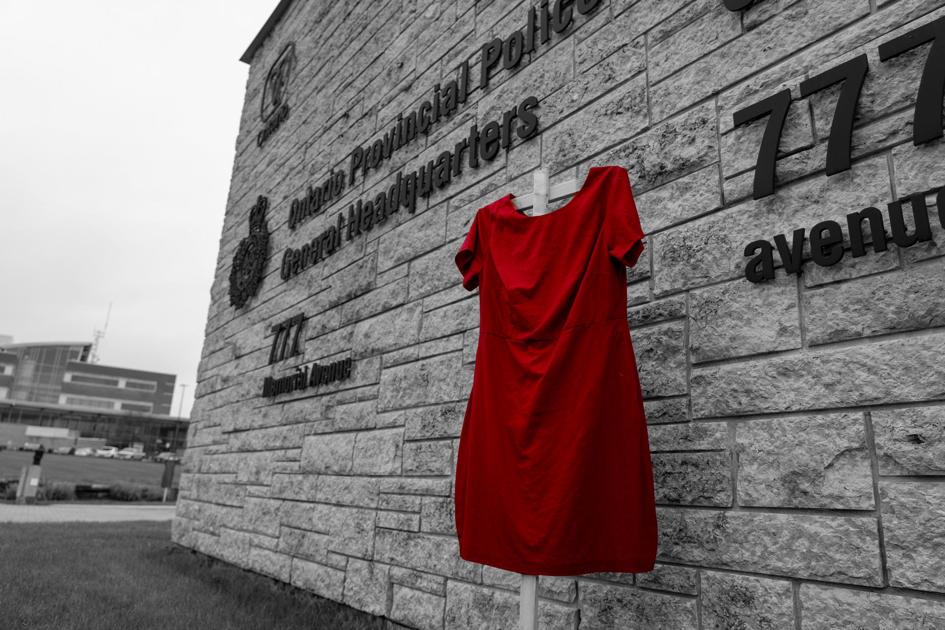 Red dress hanging in front of OPP GHQ