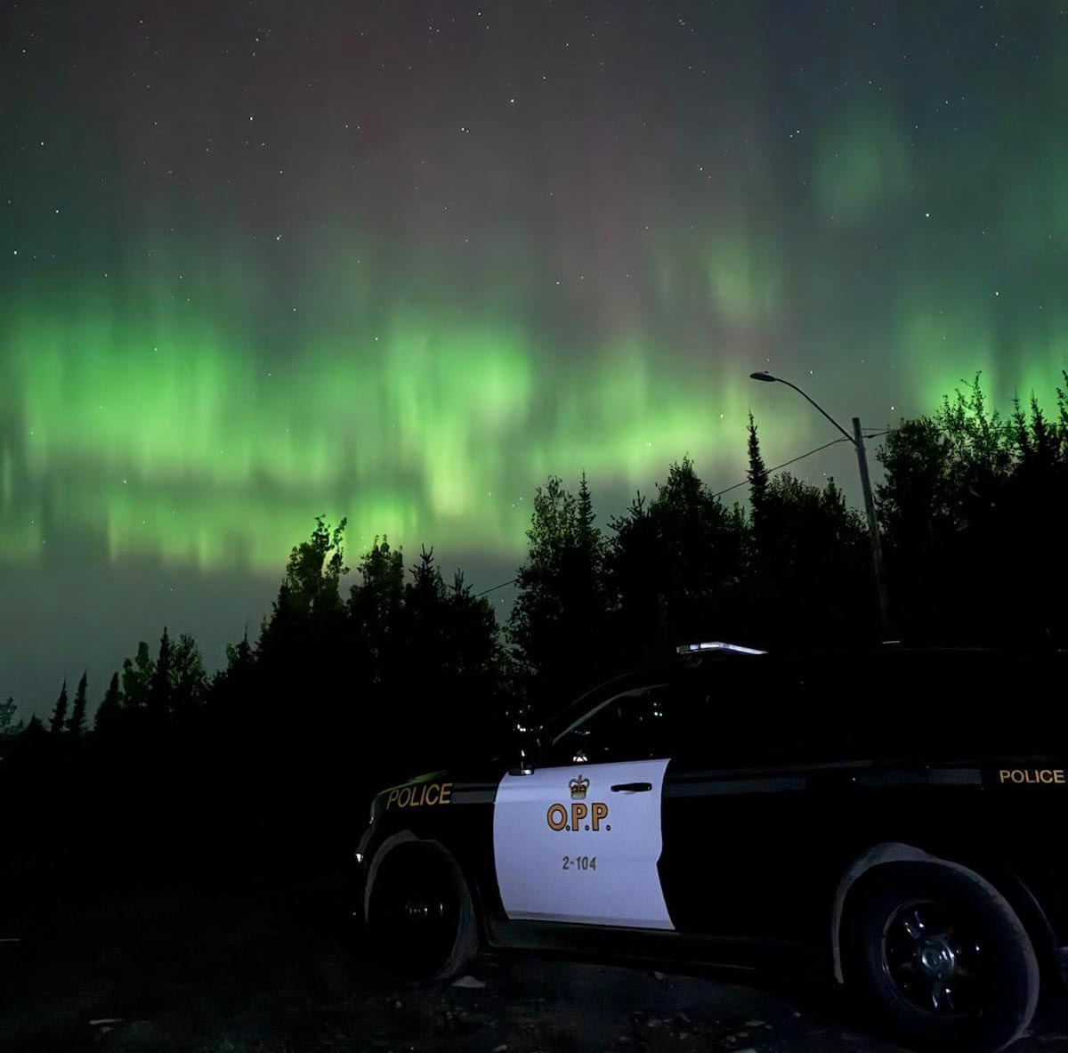 OPP Cruiser with Northern Lights at night