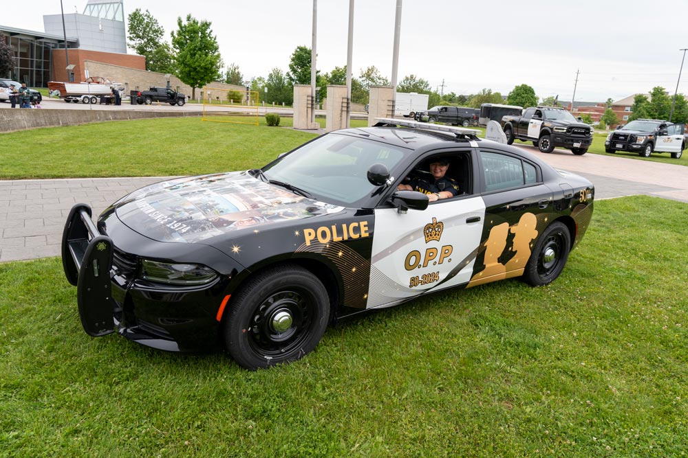 OPP Women in uniform wrapped vehicle