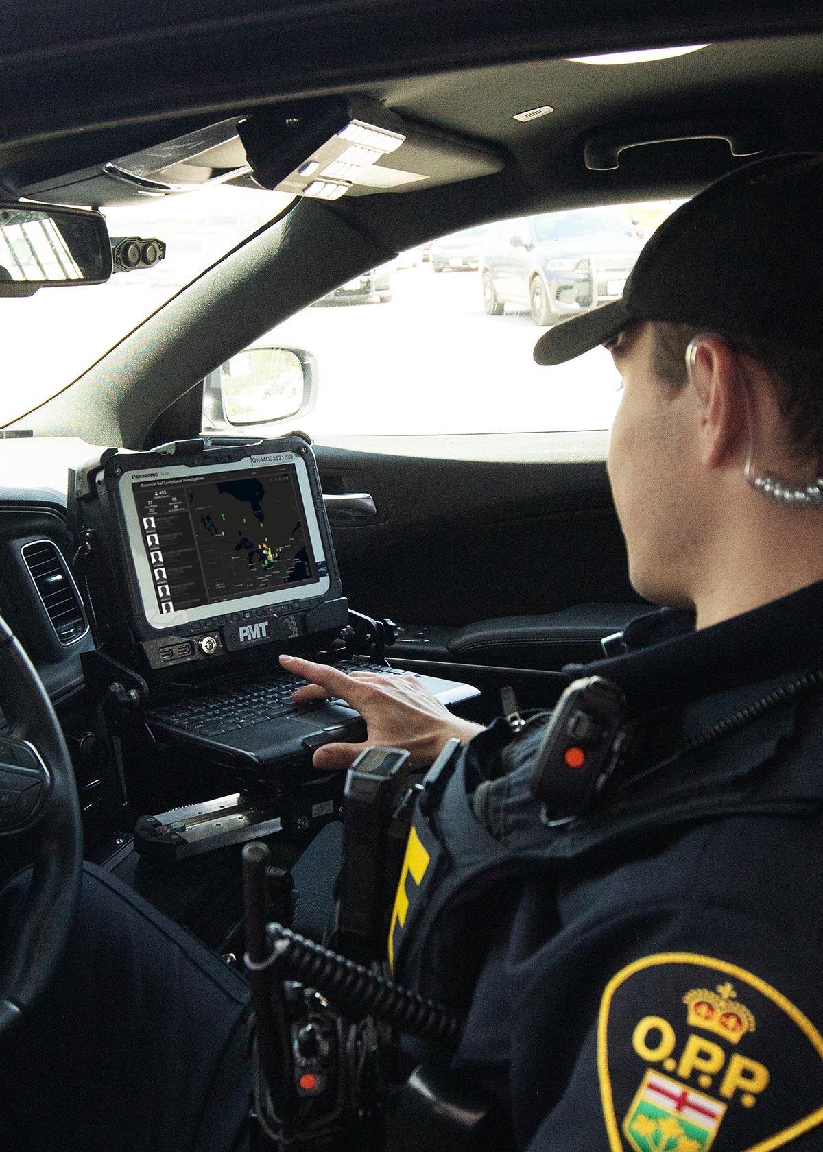 OPP officer using mobile computer