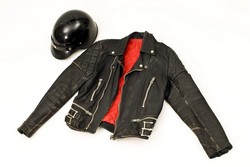 This black leather jacket and motorcycle helmet were worn during undercover operations by Provincial Constable Ross Nichols from 1985 – 1990.